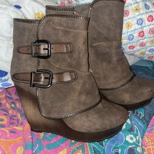 Boutique brown Not Rated heeled boots. One scuff mark on r side. Worn 2-3 times